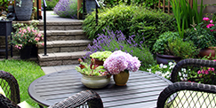 Patio With Flowers In Garden