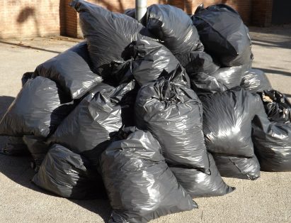 Black Trash Bags In A Pile