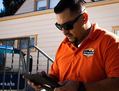 Altitude Hauling Crew Member With Tablet