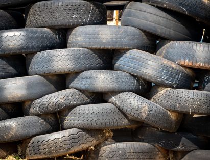 stack of tires to be removed by Altitude Hauling