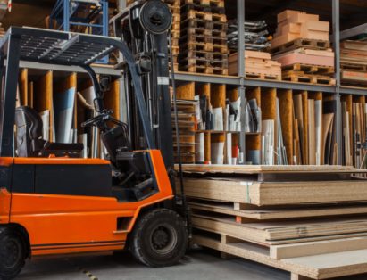 parked forklift with pallet of materials on froks